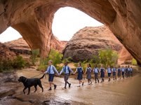 Schoolchildren-walking-under-rock-arches.jpg